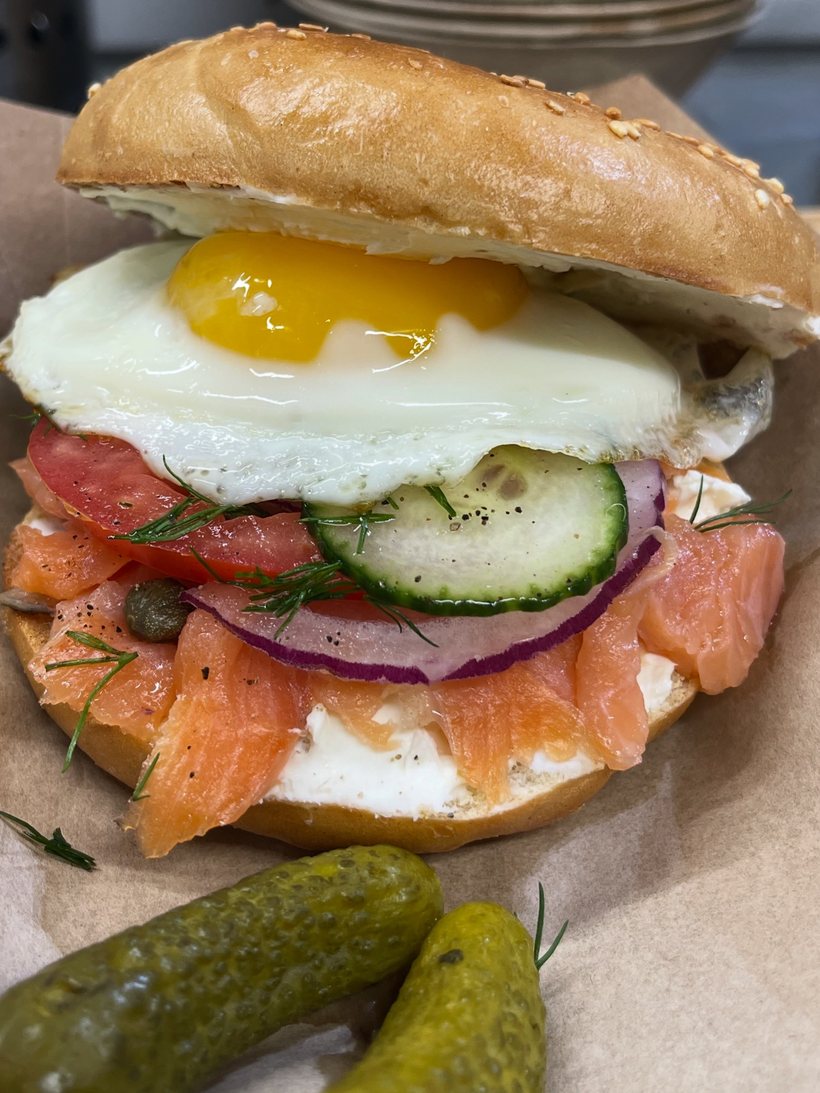 Dèlf Surf Bagel served with pickles — breakfast and brunch in Sunrise, FL